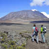 Hikers looking at the Mount Kilimanjaro