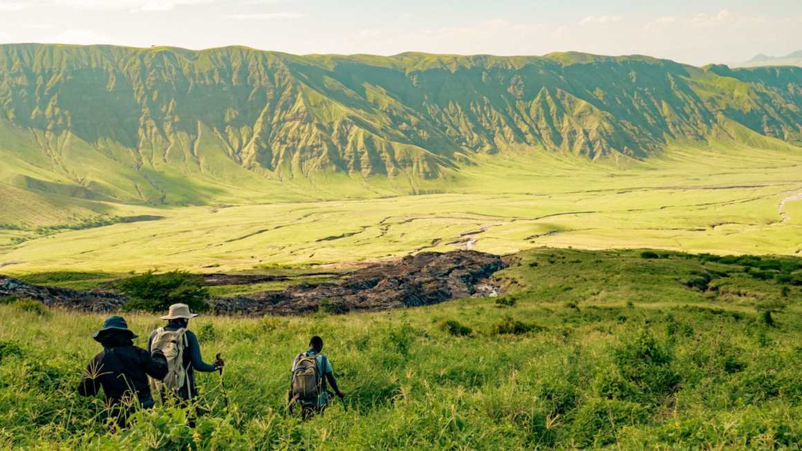 A group of people trekking to the Ngorongoro crater