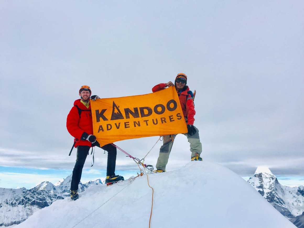 Climbers on the summit of Island Peak