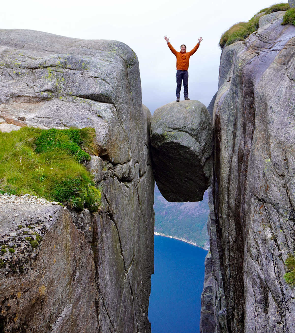 Dan stands on Kjeragbolten Norway