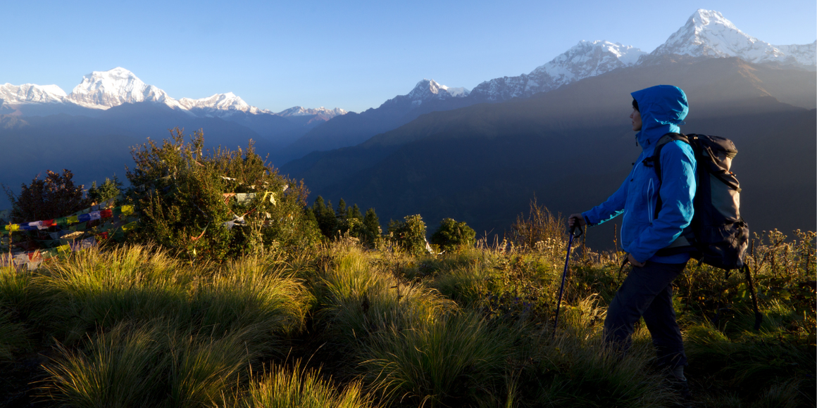 Early morning - trekker on Poon Hill at sunrise