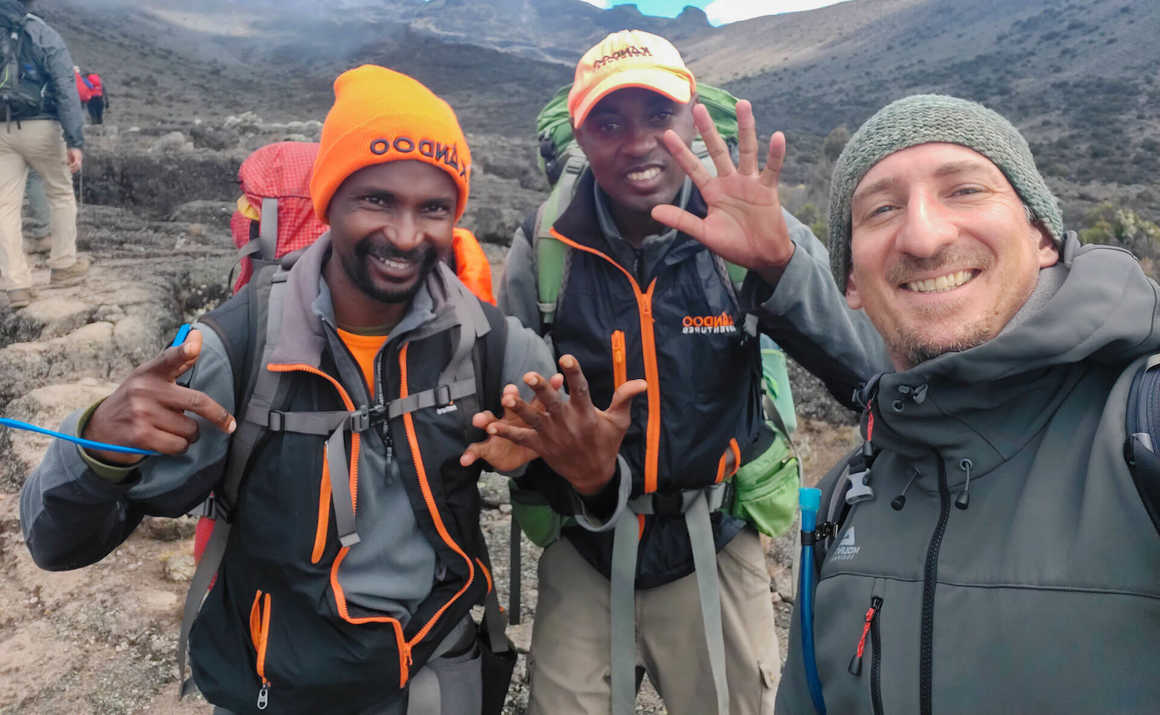 Hiker and guides on Kilimanjaro