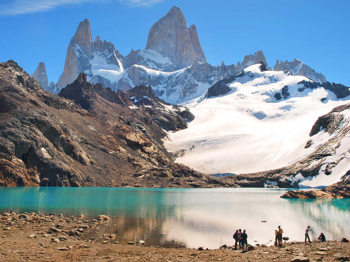 Hikers in front of a lake in El Chalten National Park