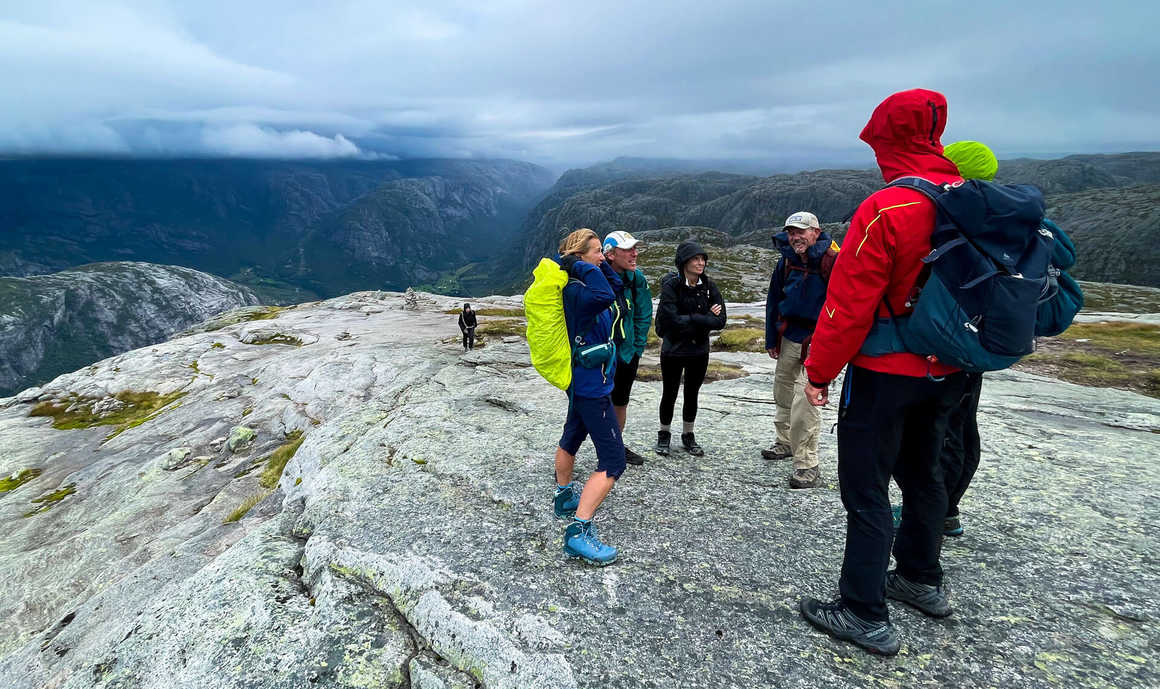 Hikers socialise on the Kjeragbolten hike in South Norway