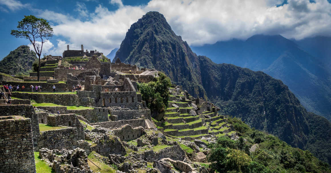 Machu Picchu with visitors exploring