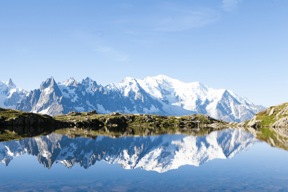 Mount Elbrus in distance reflecting onto water