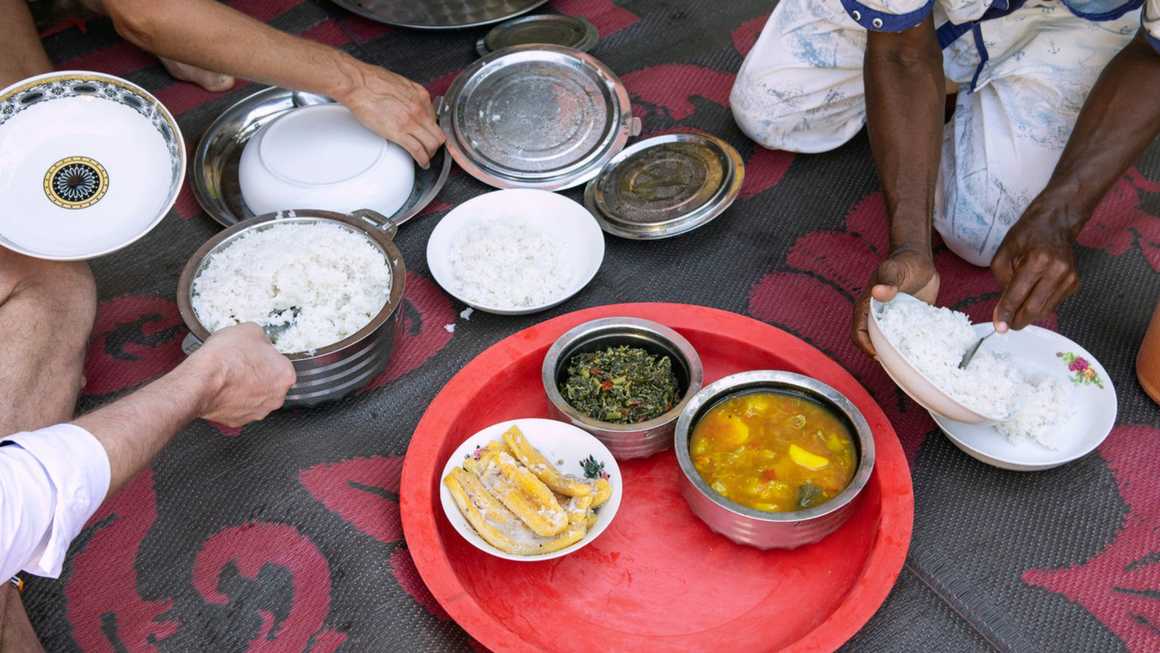 People sharing Tanzanian food