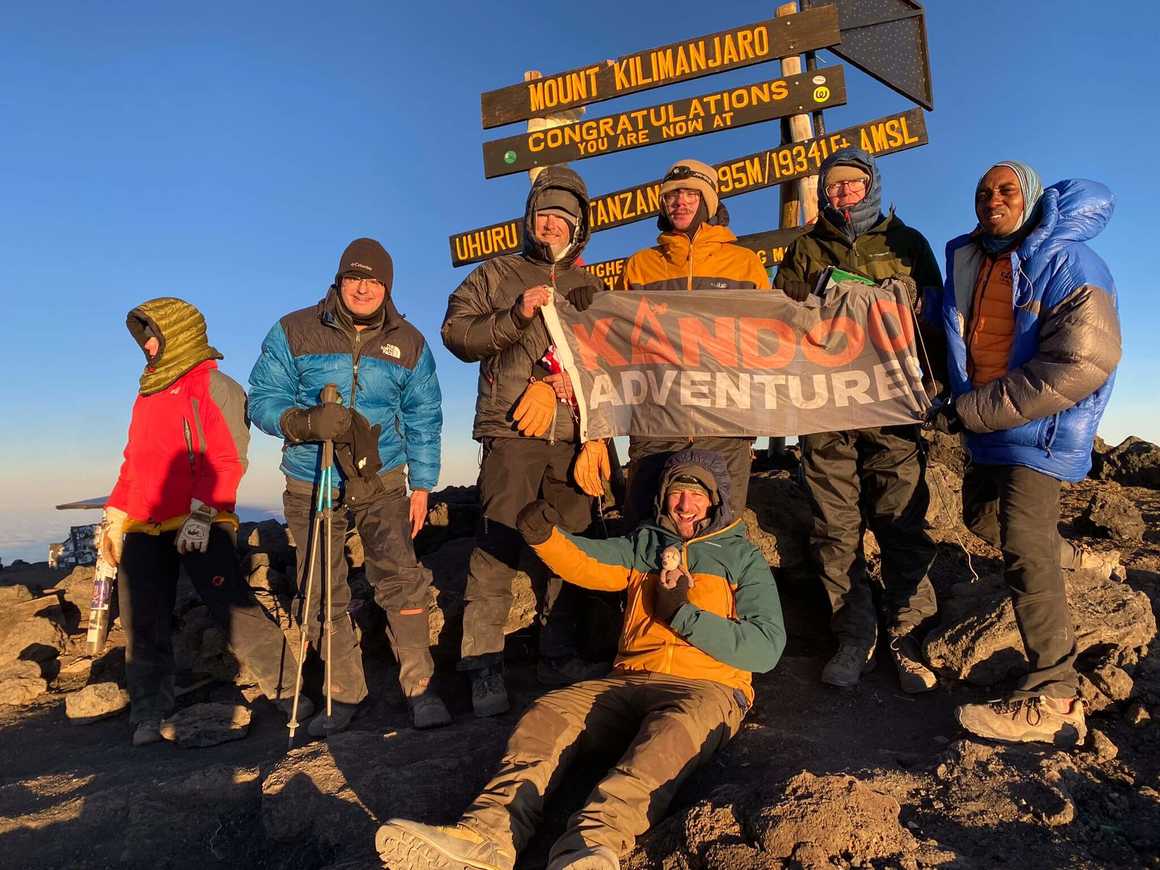 Sam Holland at Kilimanjaro Summit with group