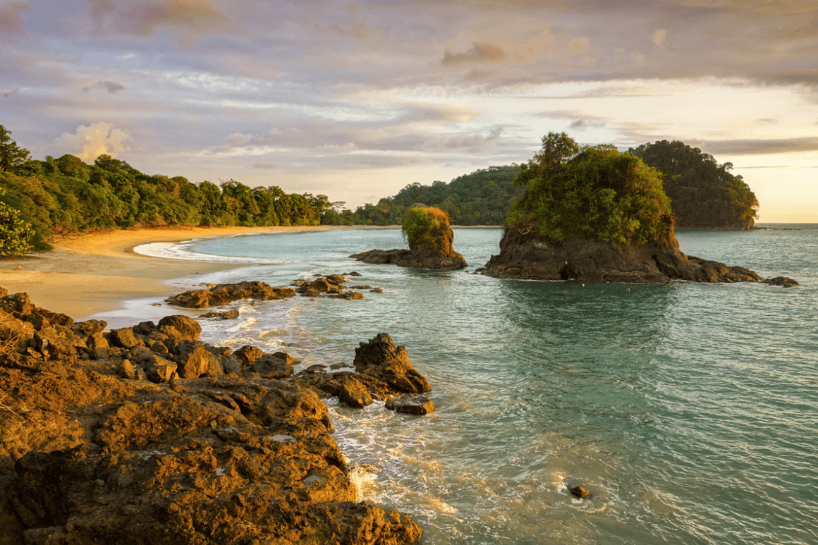 Scenic Sunset View and Dramatic Landscape of Playa Espadilla Beach in Manuel Antonio National Park Costa Rica