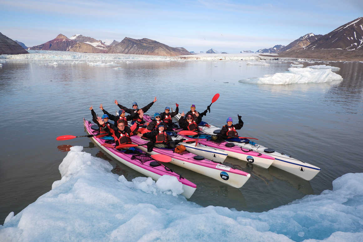 Sea kayaking in King's Bay in Spitsbergen