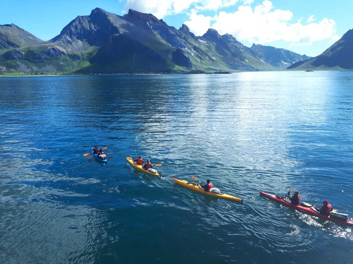 Sea kayaking in Lofoten islands during summer