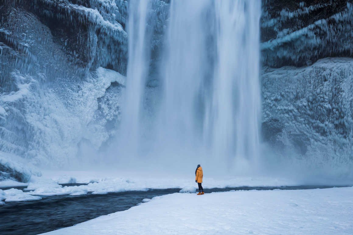 spray-from-a-frozen-skogafoss-waterfall