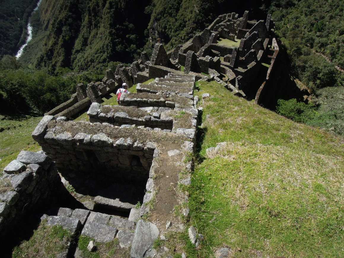 Steps down steep slopes at Machu Picchu