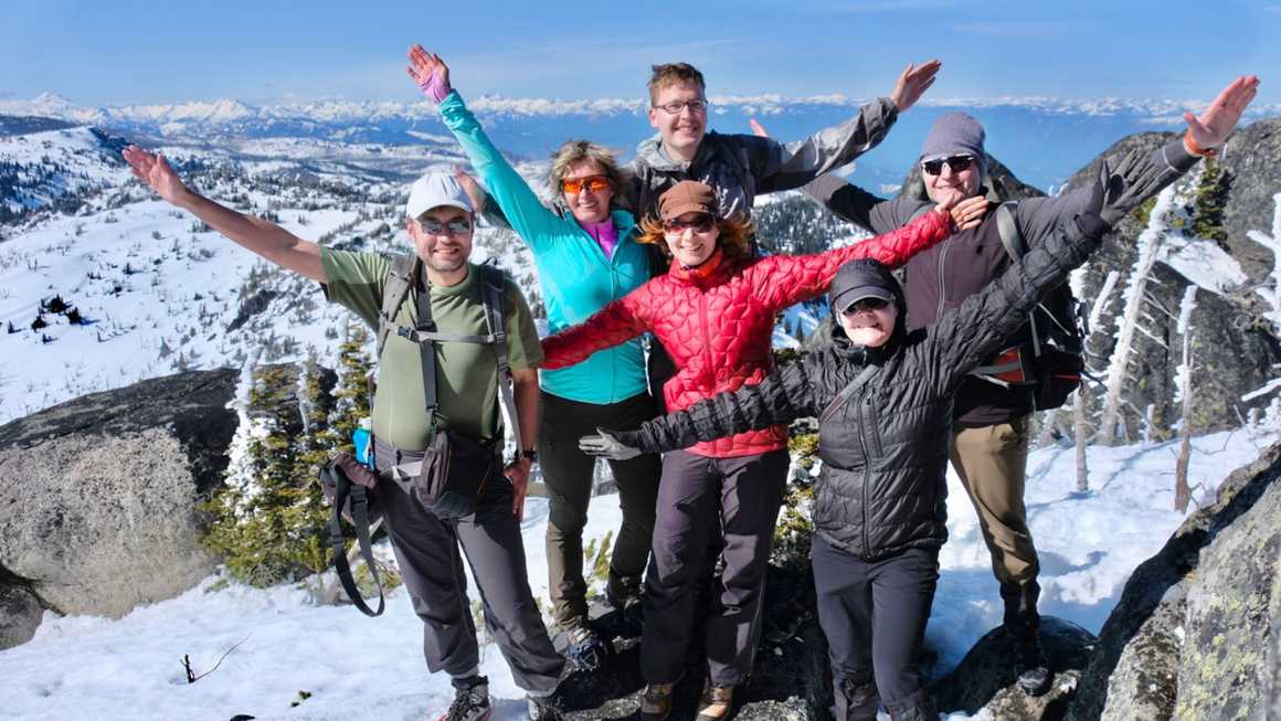 Successful group of friends on mountain top