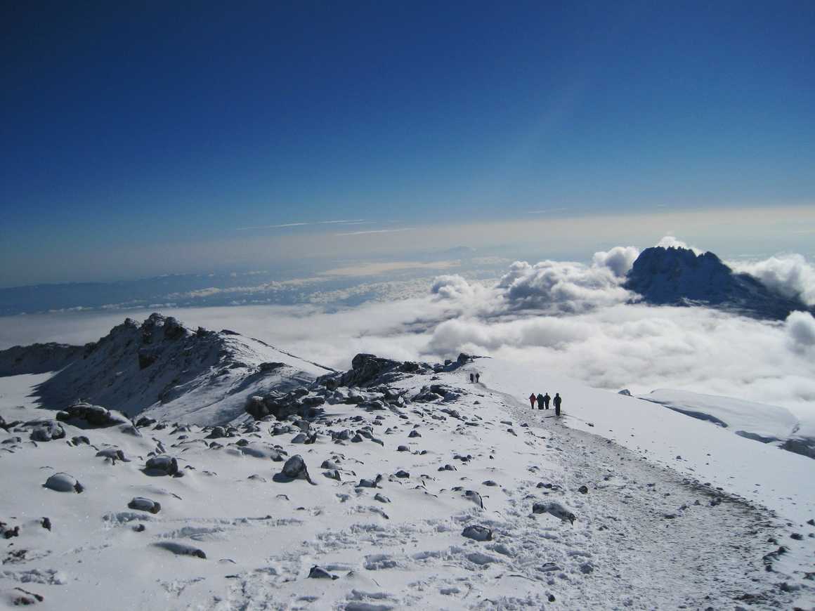 Treking on Kilimanjaro plateau, between clouds and snow