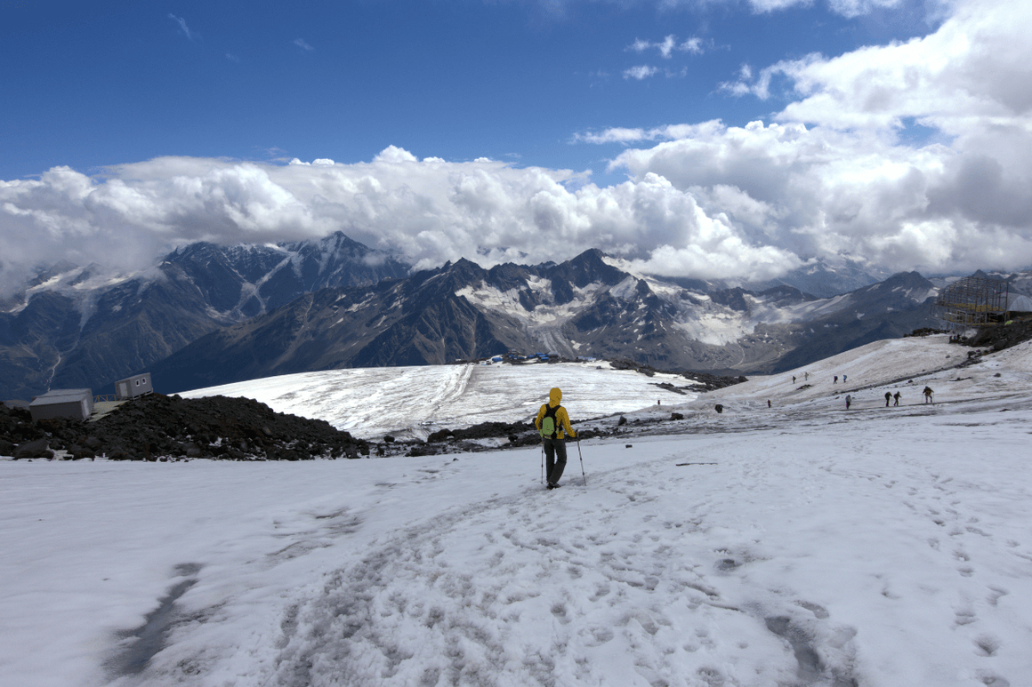 trekker walking into the distance on mount Ebrus