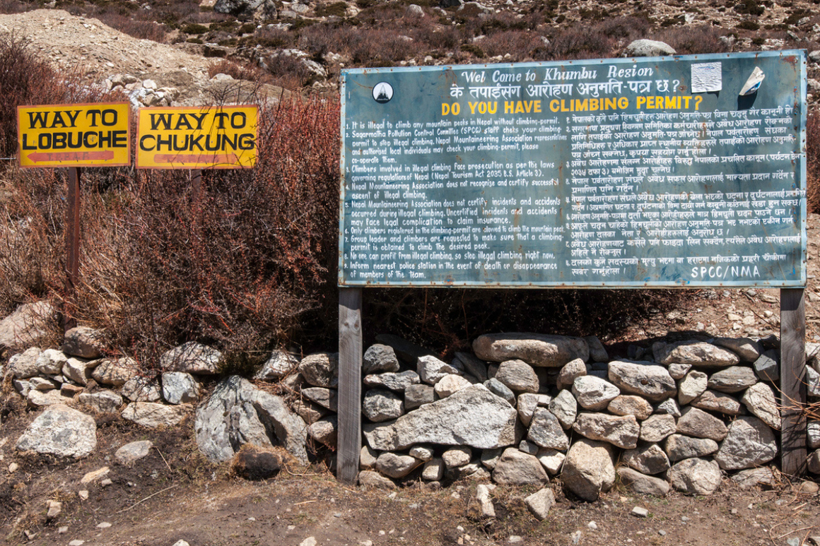Trekking permit signpost way to lobuche and chukung from dingboche nepal
