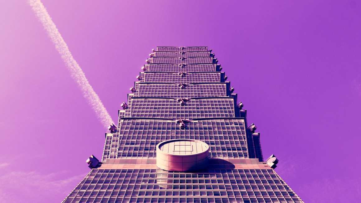 View of taipei 101 with a pink sunset sky