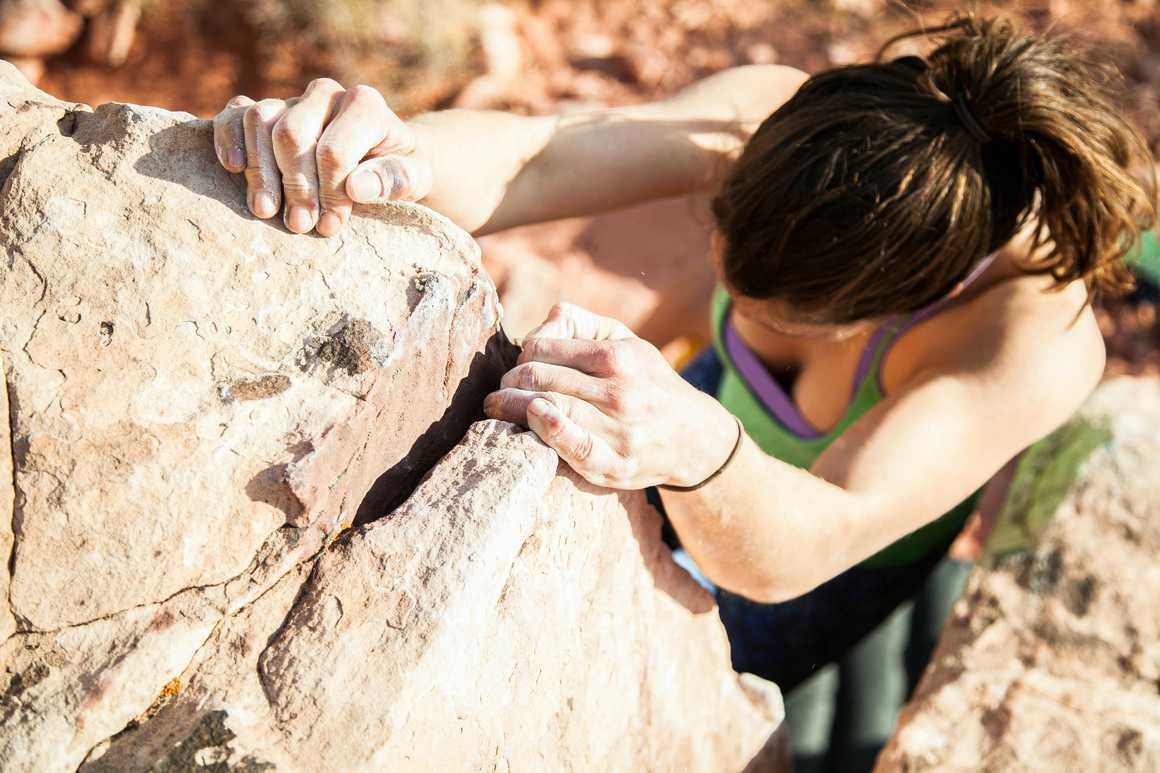 Woman free climbing in Red Rock Canyon