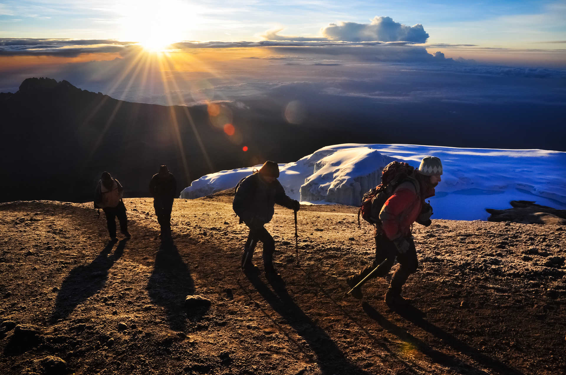 Group of hikers arriving at the Kili summit