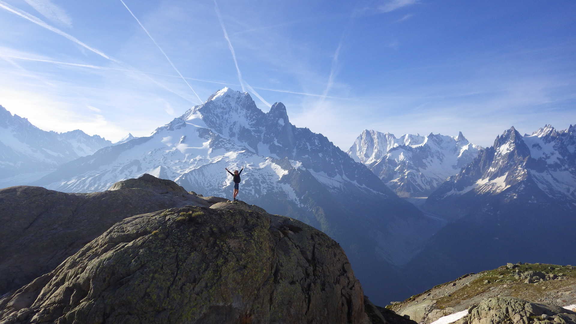 Hiker in front of the Mont Blanc massif
