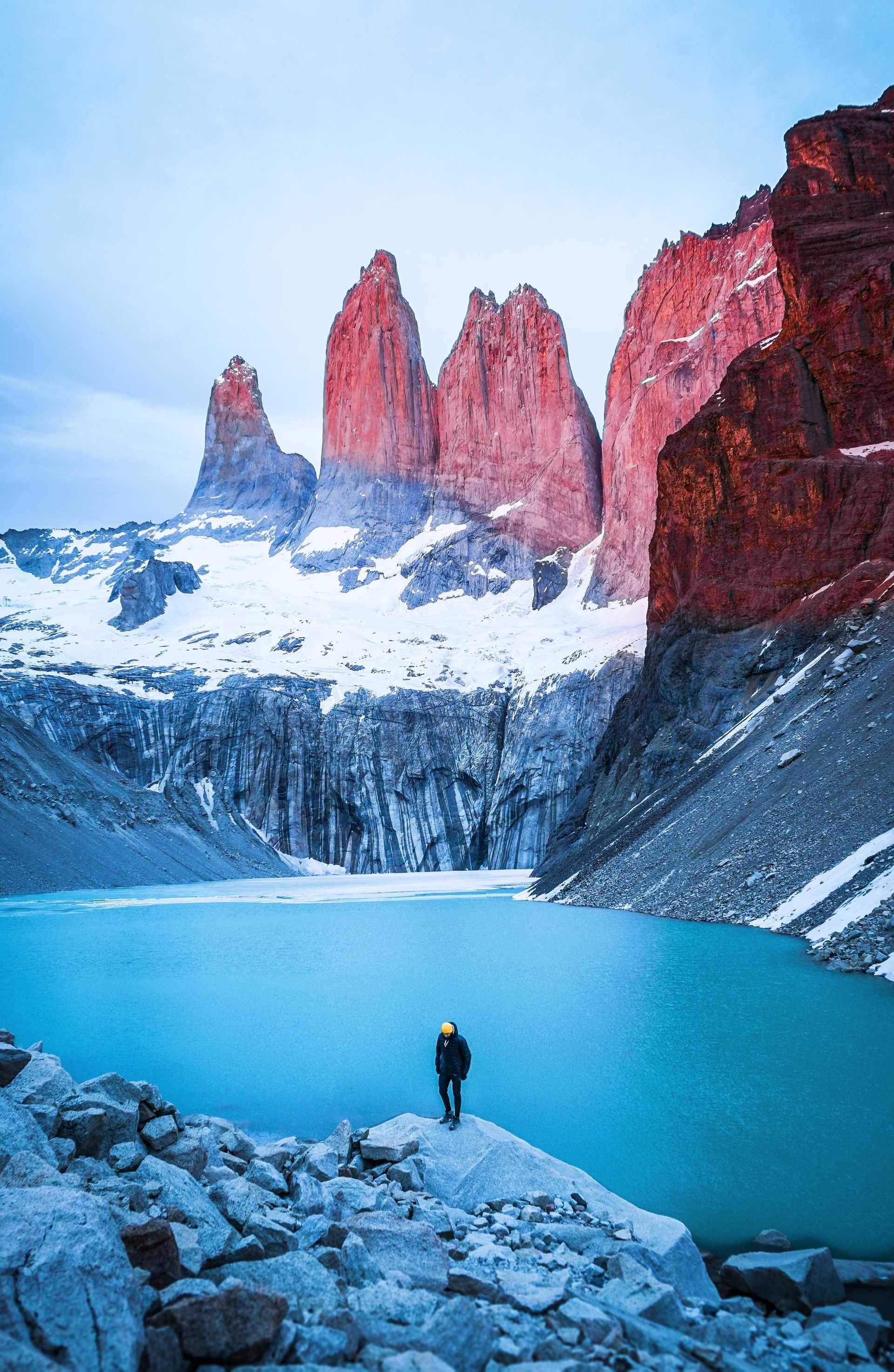 Man standing on rock in Torres del Paine National Park