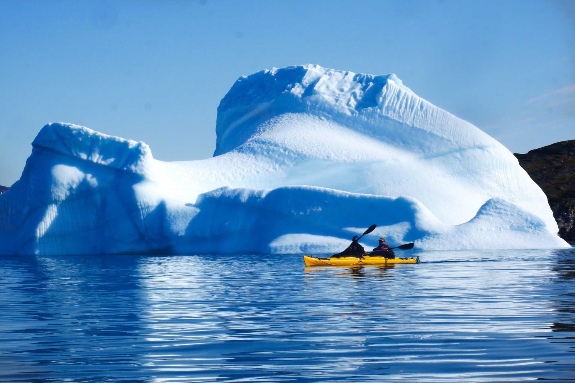 Sea kayaking among icebergs