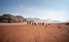 Small group hiking in the Wadu Rum desert