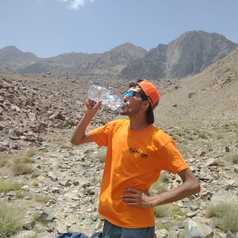 Omar-the-guide-having-a-quick-drink-near-Lac-D'Ifni