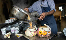 Chai being poured into pots
