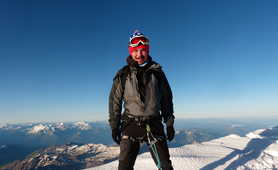 Climber on the top of the Mont Blanc