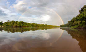 Essequibo-river-flowing-beneath-a-rainbow