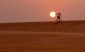 sandboarding-at-sunset