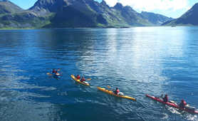 Sea kayaking in Lofoten islands during summer