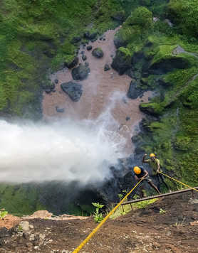 Abseiling down Sipi Falls in Uganda