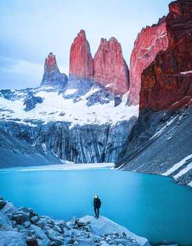 Man standing on rock in Torres del Paine National Park
