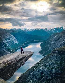 Trekker standing on Trolltunga