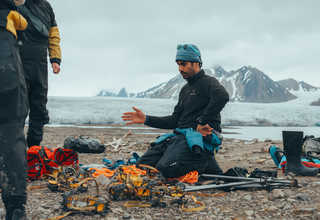 Svalbard guide briefing group on glacier hike