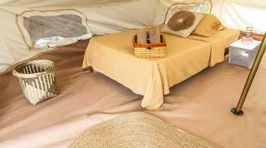 Bedroom in tent at WAO Kamp