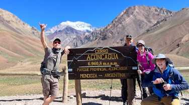 Group arrival at Aconcagua sign