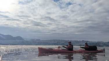 Kayaking amongst sea ice in Svalbard