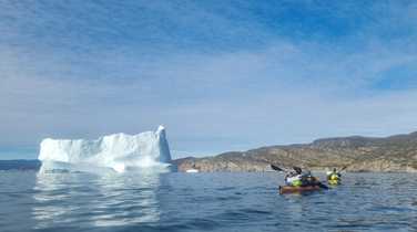 kayaking-past-humungous-icebergs
