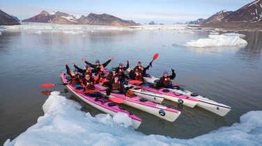 Sea kayaking in King's Bay in Spitsbergen