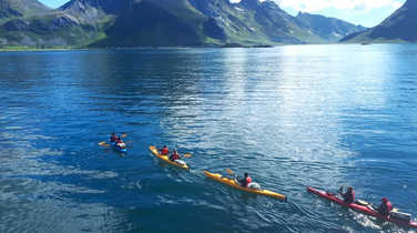 Sea kayaking in Lofoten islands during summer