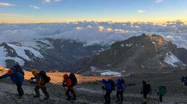 Setting-off-above-the-clouds-on-summit-day