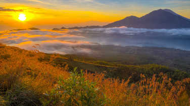 Sunrise from Mt. Batur, with view on Mt. Agung