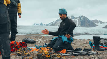 Svalbard guide briefing group on glacier hike