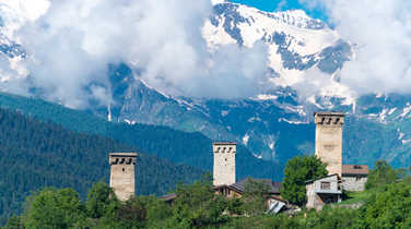 Svan-towers-peeking-out-from-the-trees