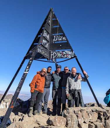 a-happy-team-on-the-summit-of-Toubkal