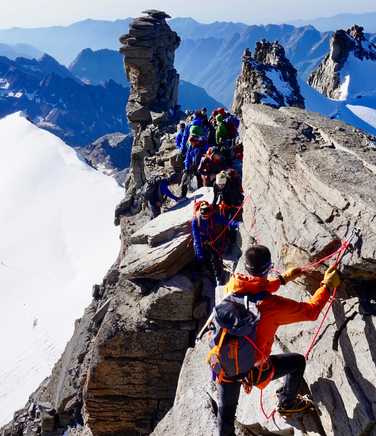 Climbers on the top of Gran Paradiso